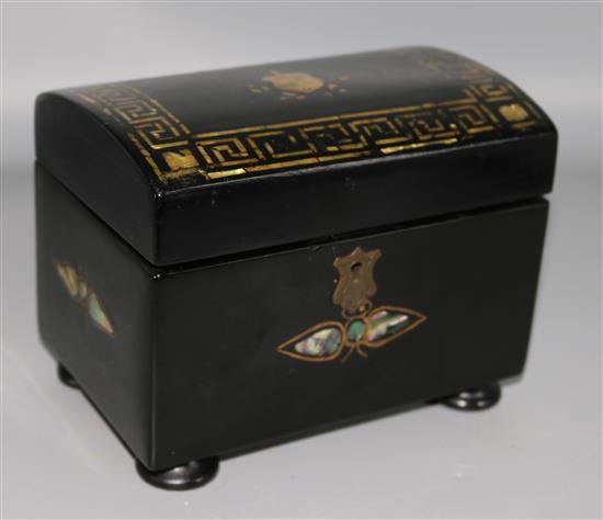 A Japanese lacquered tea caddy